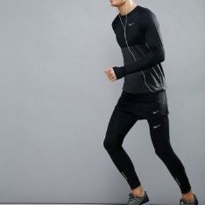 Nike Pants - LIKE NEW! Men's Nike runner leggings size MED Nike Pants - LIKE NEW! Men's Nike runner leggings size MED